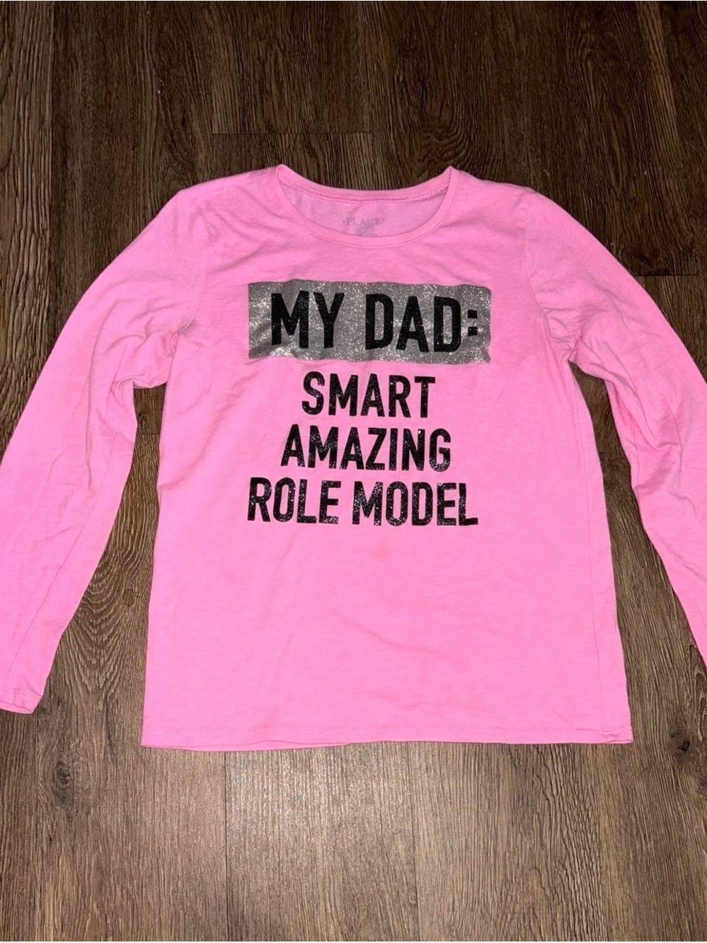 Pink long sleeve shirt with sparkly text